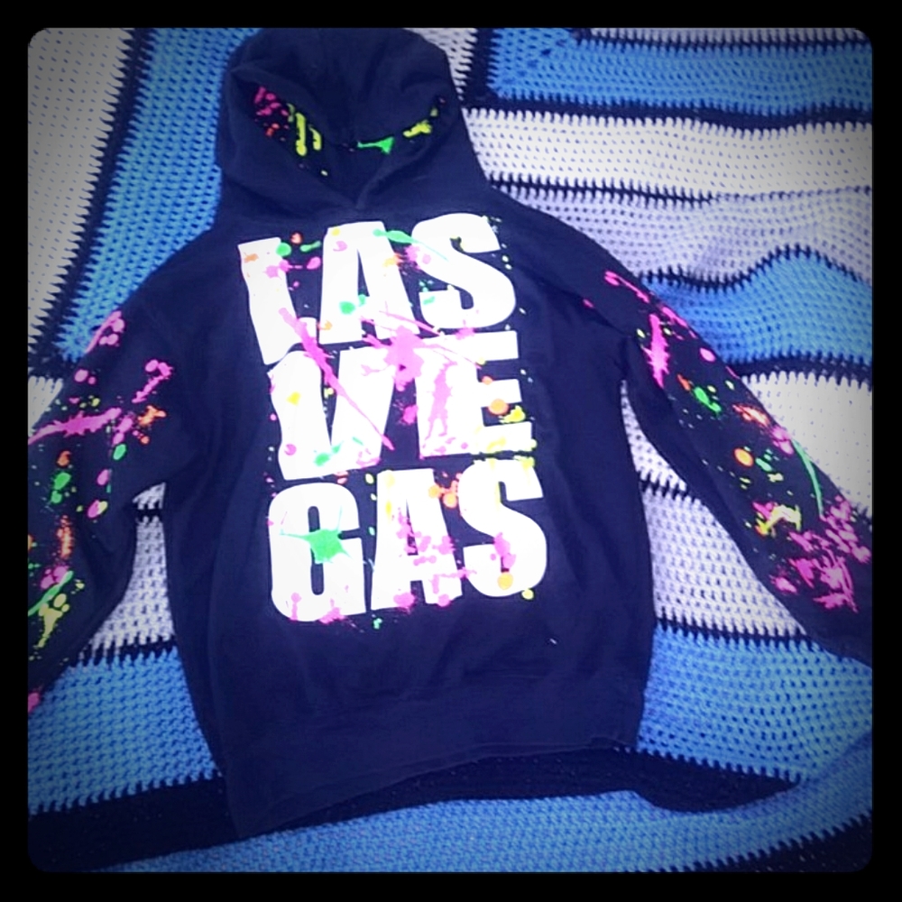 A lasvegas hoodie with "paint " splaters